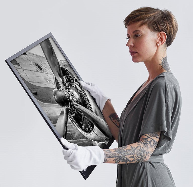 Female art expert posing in gallery